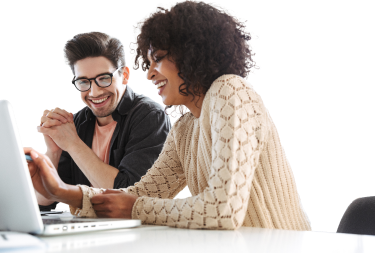 Colleagues smiling and working