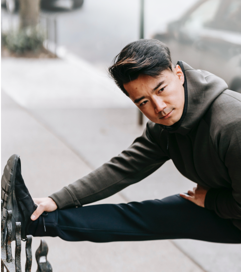 Men stretching before running
