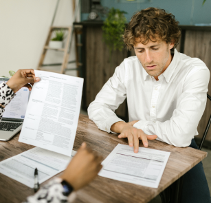 men reading a contract
